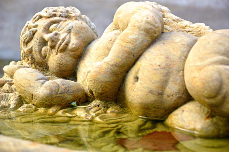 Reclining boy in water
